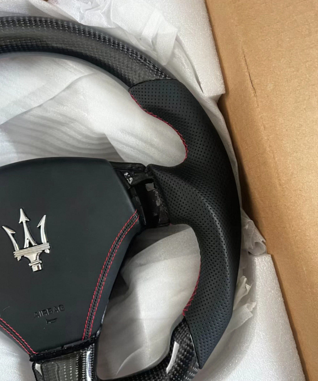 Handcrafted custom steering wheel exclusively for Maserati GranTurismo Convertible.